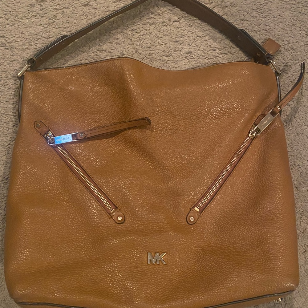 Michael Kors leather purse.  Chestnut color.  Authentic.  Good condition.